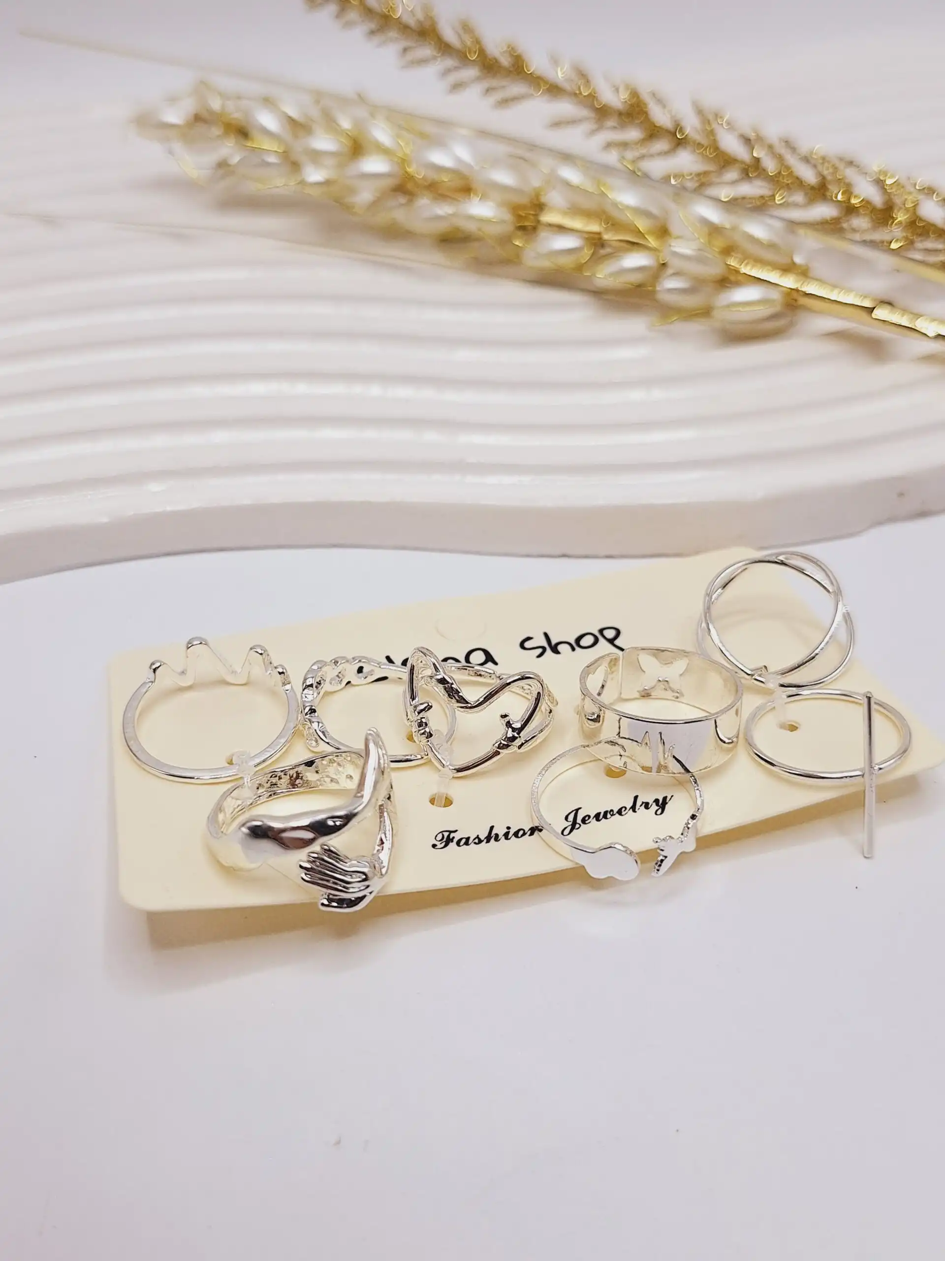 پک انگشتر Selena نقره ای طرح آغوش آبکاری رادیوم