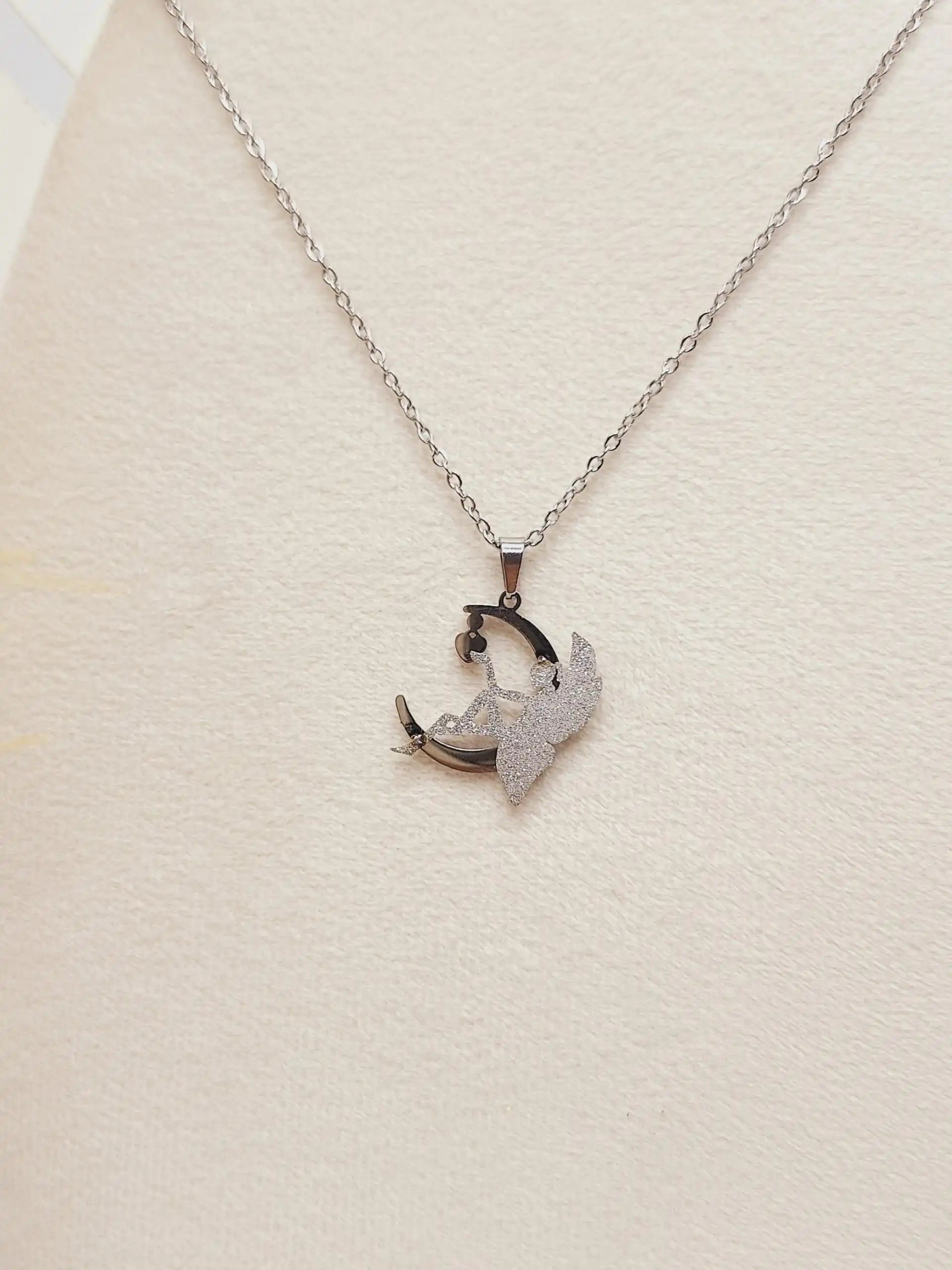 ست گوشواره و گردنبند طرح فرشته و ماه نقره ای استیل