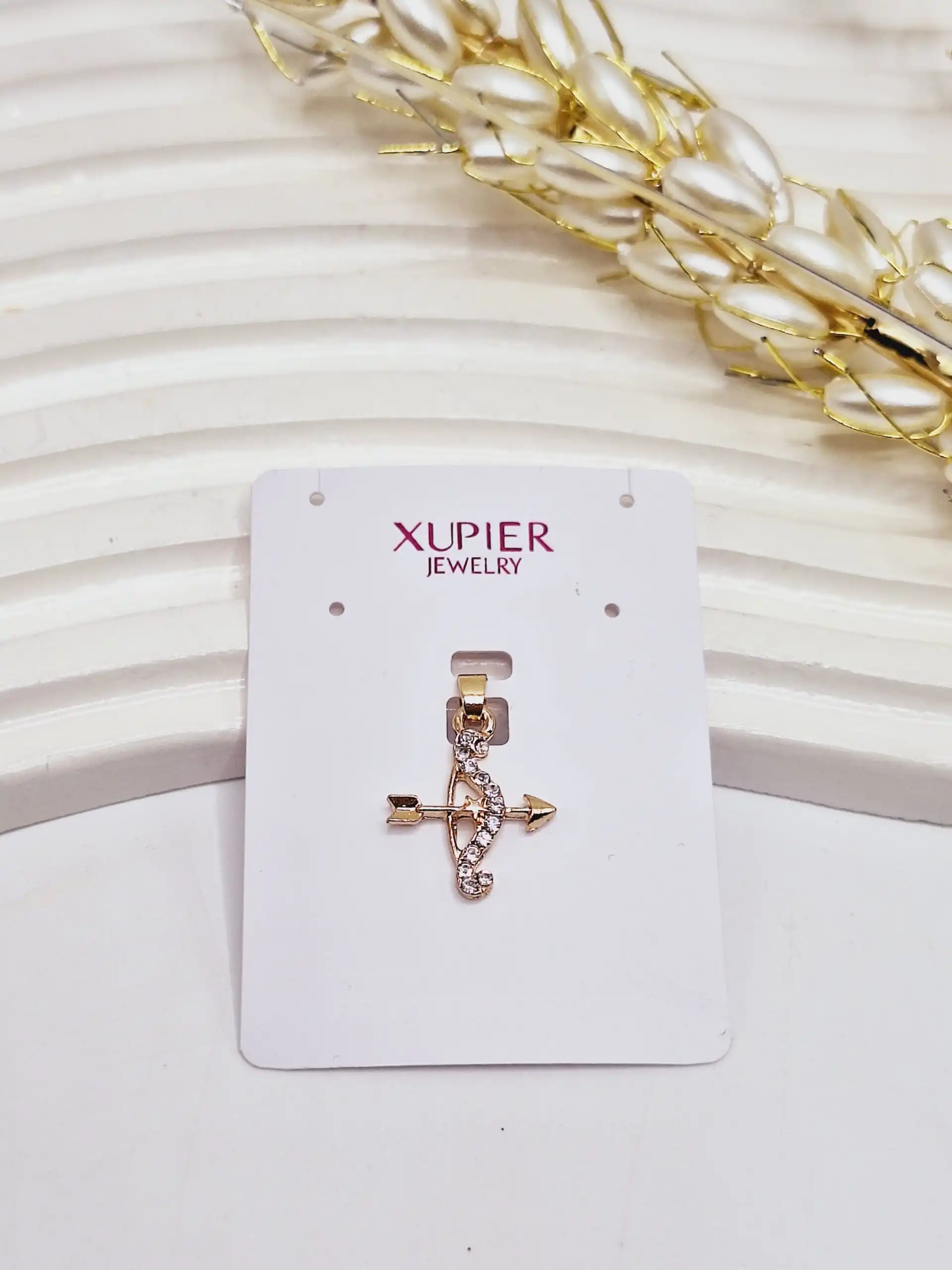 پلاک تیرکمان نگین دار مینمال طلایی ژوپینگ