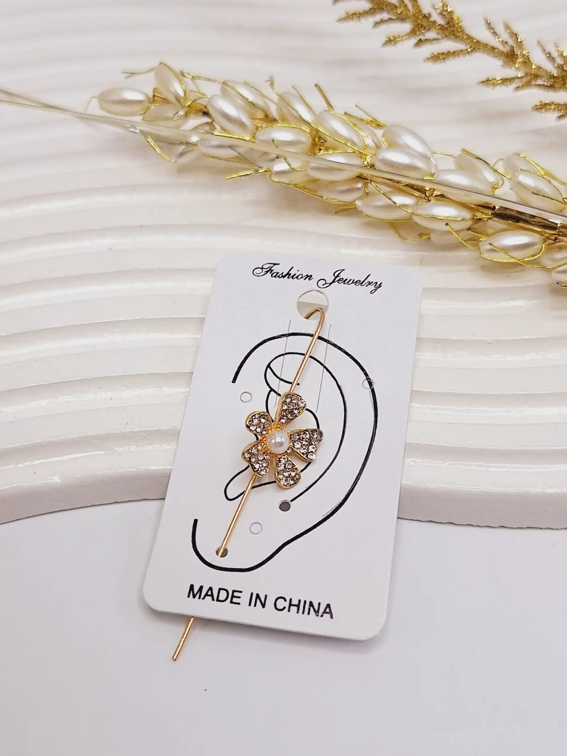 گوشواره ایرکاف طرح گل برجسته طلایی