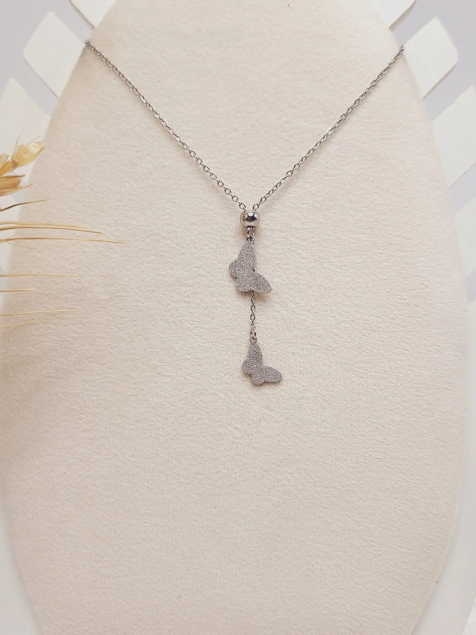 ست گوشواره و گردنبند طرح پروانه نقره ای استیل