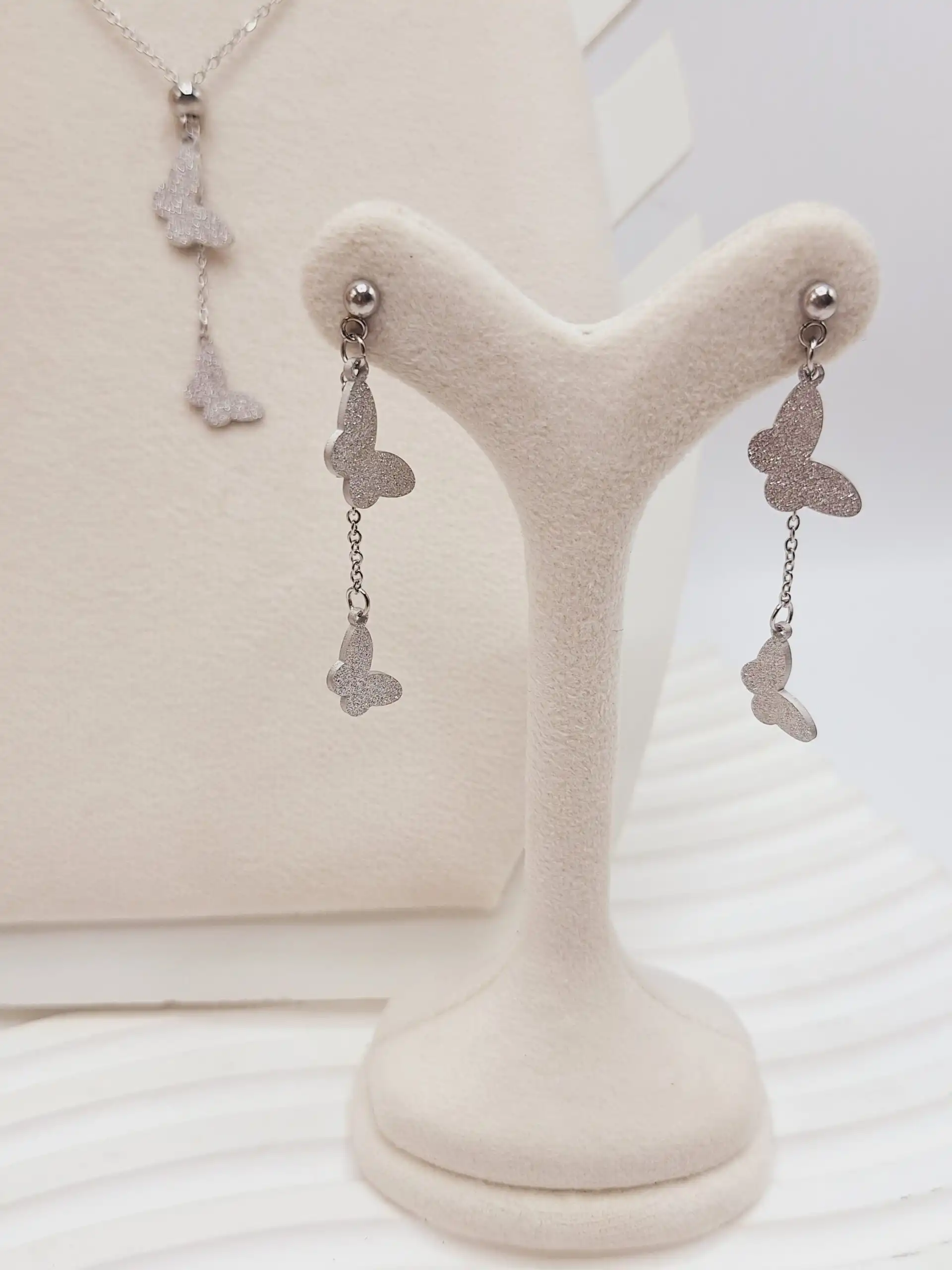 ست گوشواره و گردنبند طرح پروانه نقره ای استیل