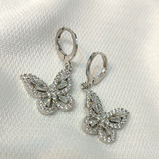 گوشواره برنجی مدل پروانه نگین دار نقره ای