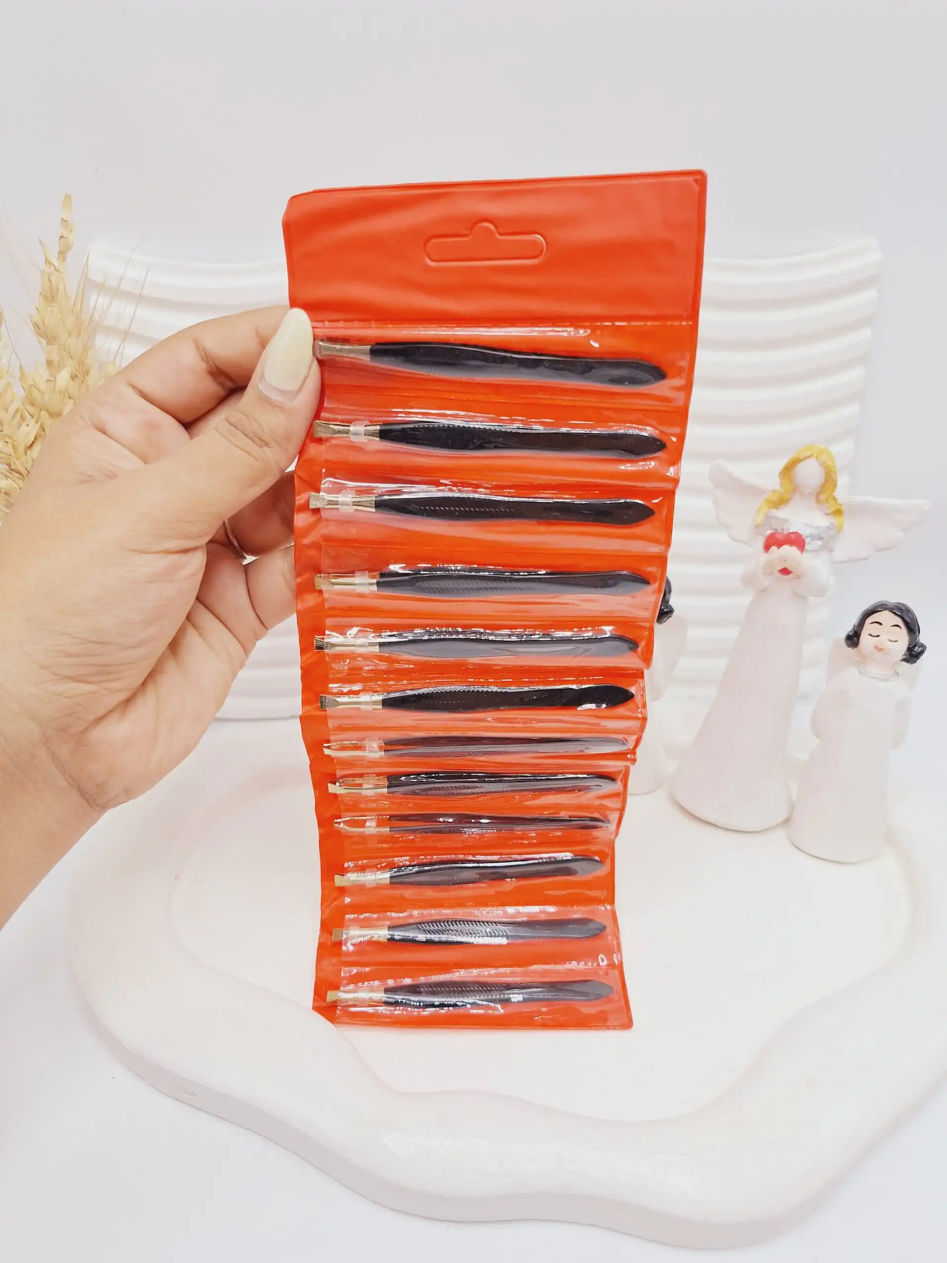 موچین زنانه دسته مشکی (کیف قرمز)