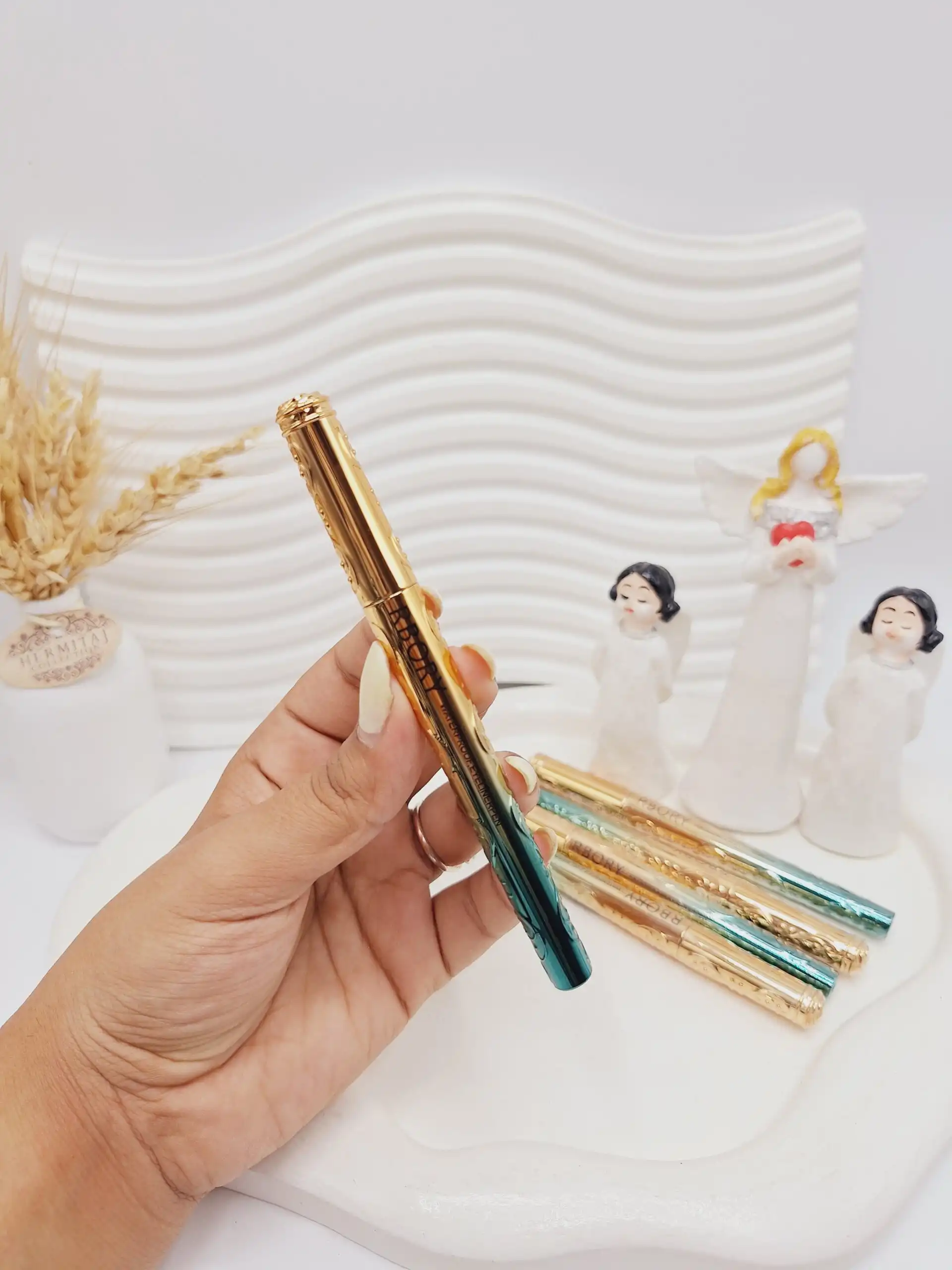 خط چشم ماژیکی کیفیت عالی برند RBORY اصلی بدنه سبز طلایی کد 6458