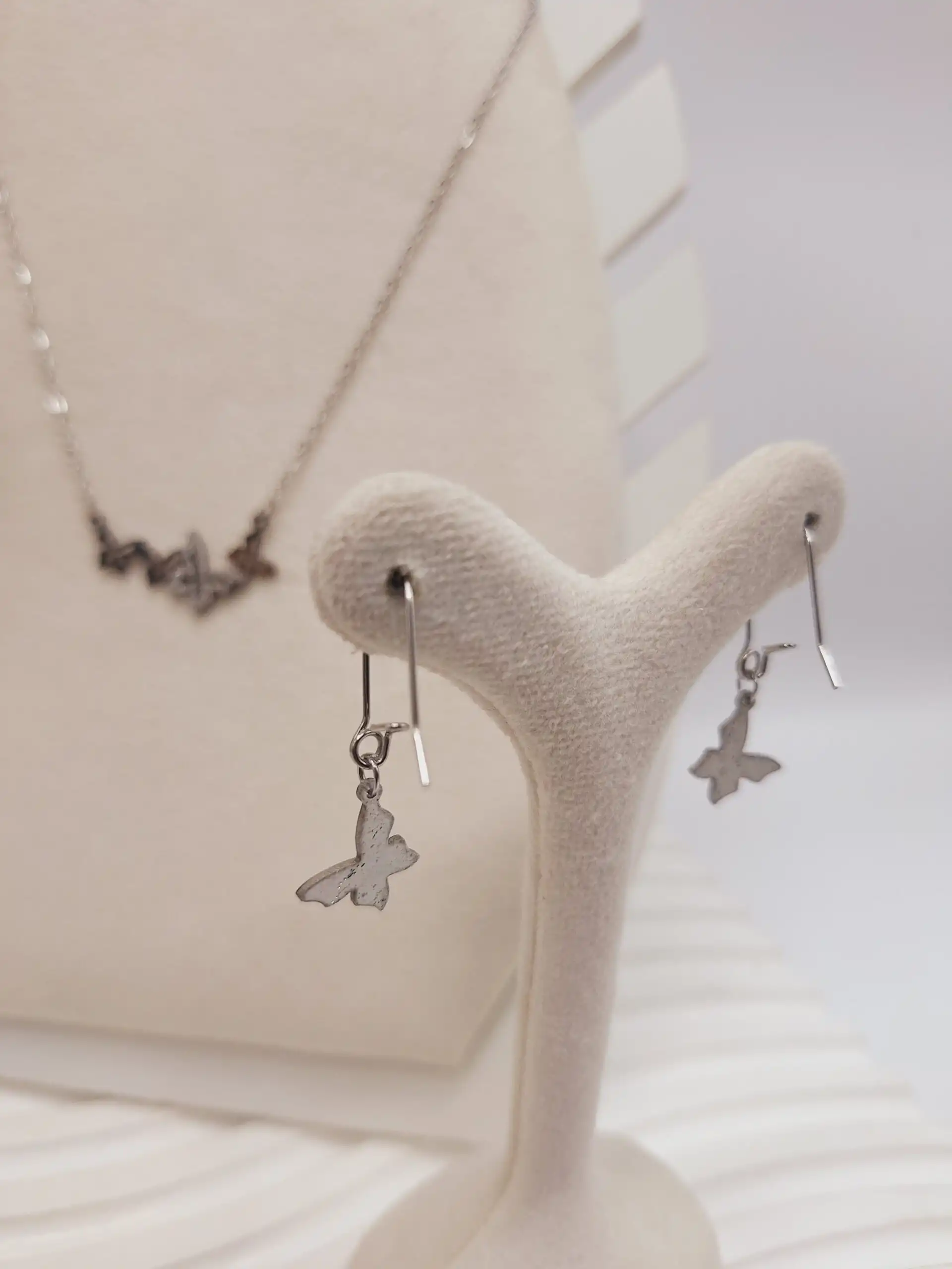 نیم ست طرح پروانه شنی نقره ای استیل