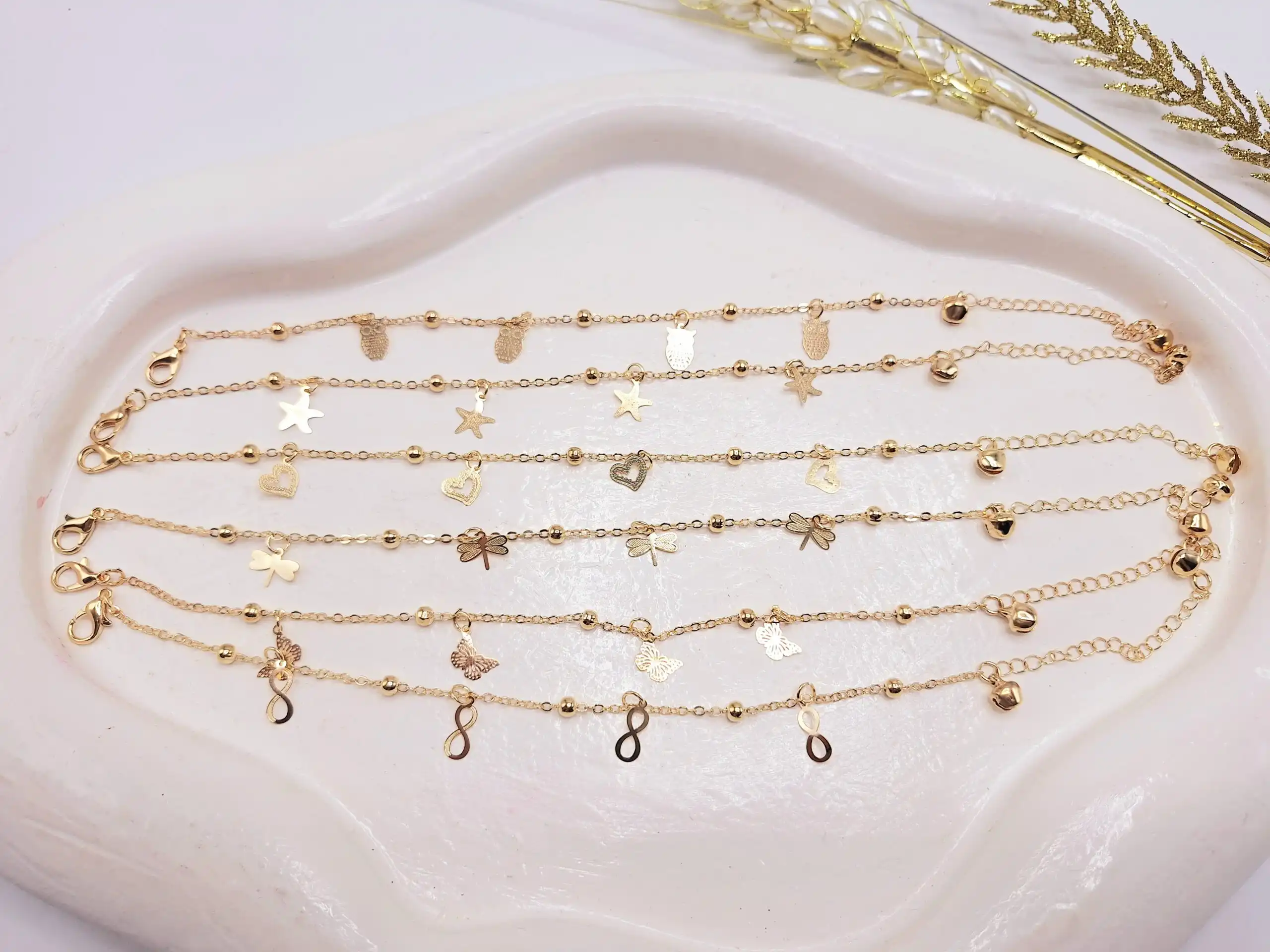 پابند طرح جغد و پروانه زنگوله دار استیل ( رنگ طلایی)