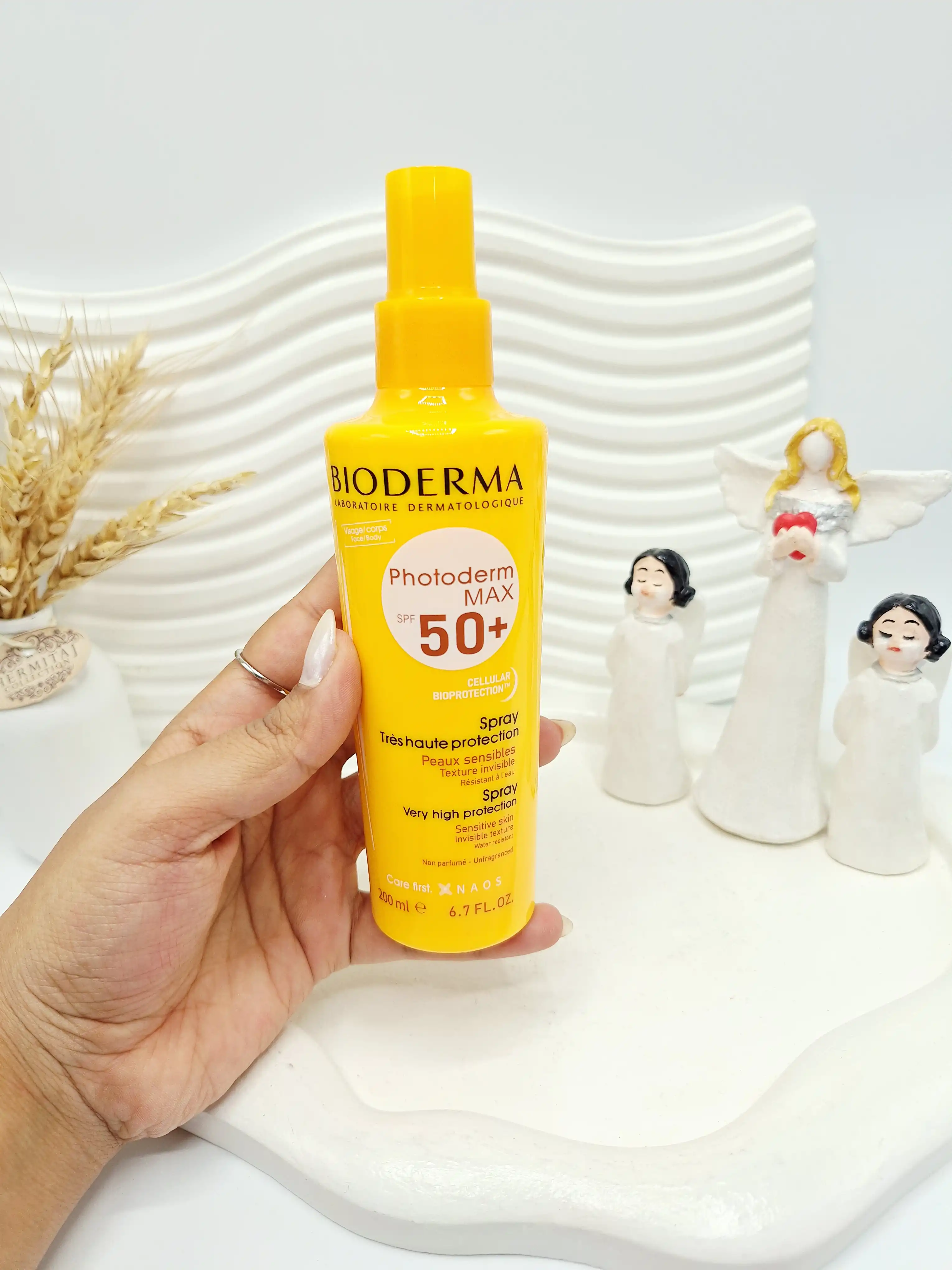 اسپری ضد آفتاب بیودرما فتودرم 200 ميل مناسب صورت و بدن کد 8742 با محافظت بالا