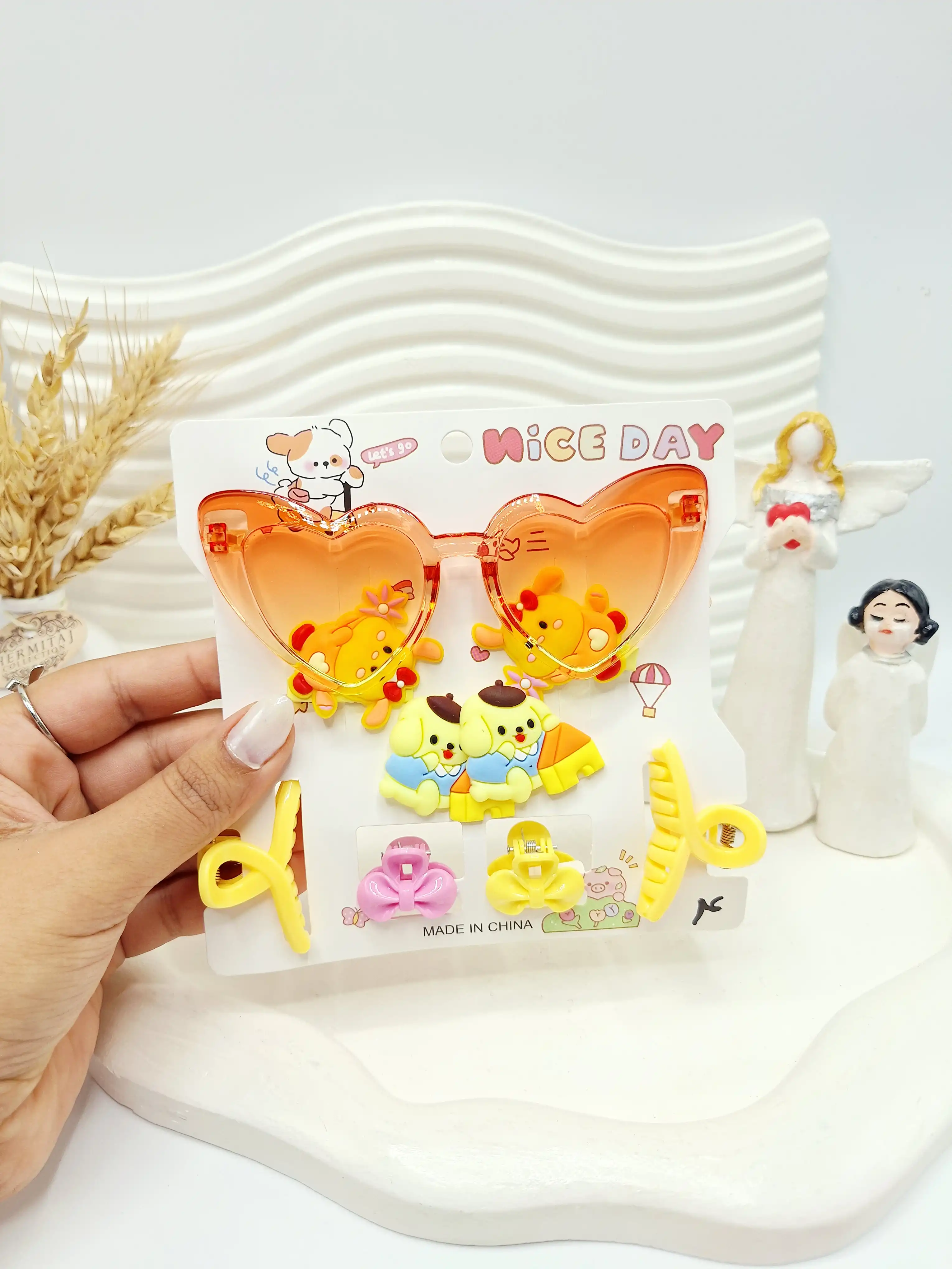 ست عینک و کش و کلیپس بچگانه طرح کیتی ( مدل عینک قلبی)