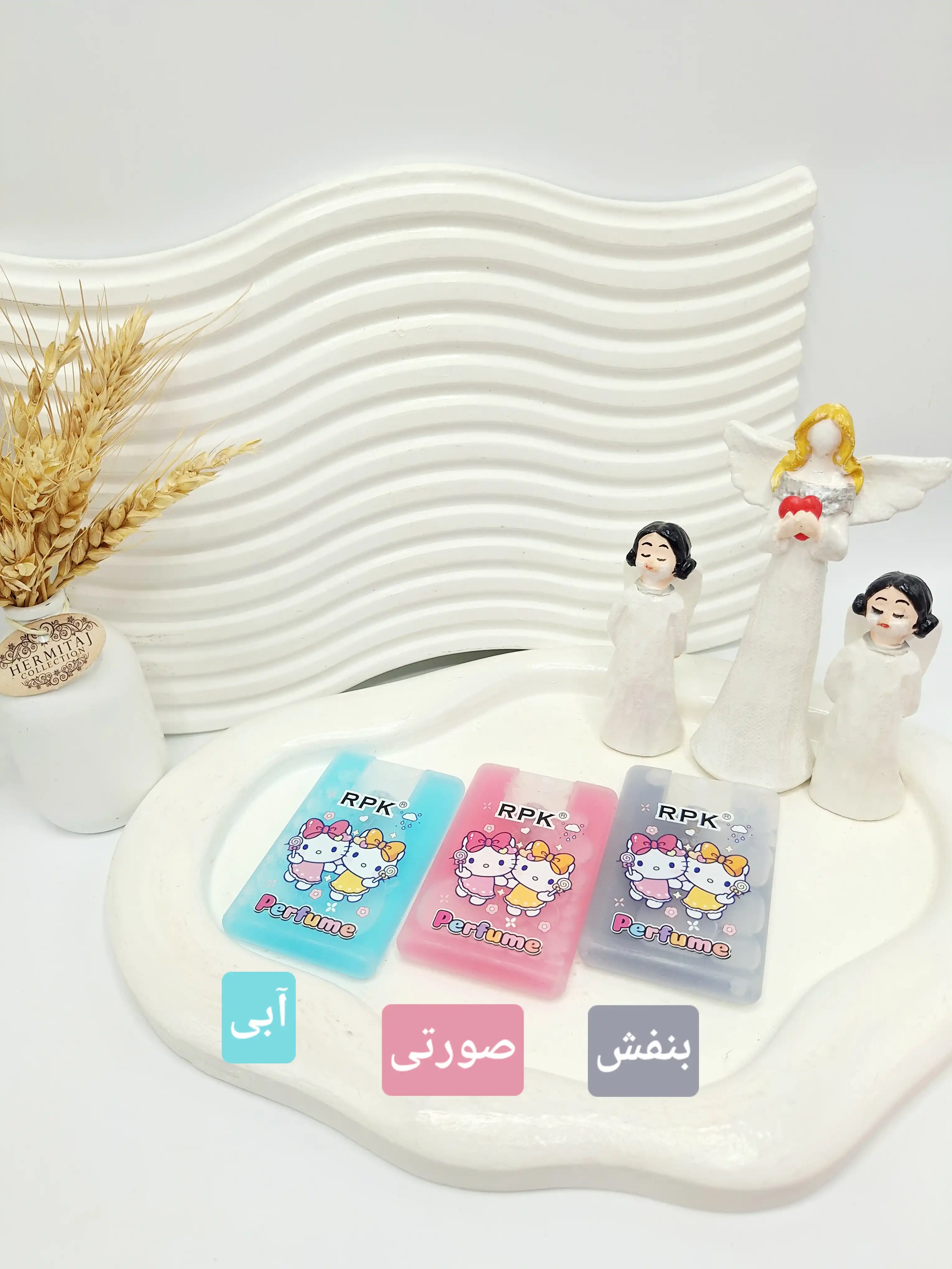 عطر جیبی مسافرتی طرح کیتی حجم 20 میل مناسب کودکان کد 1461