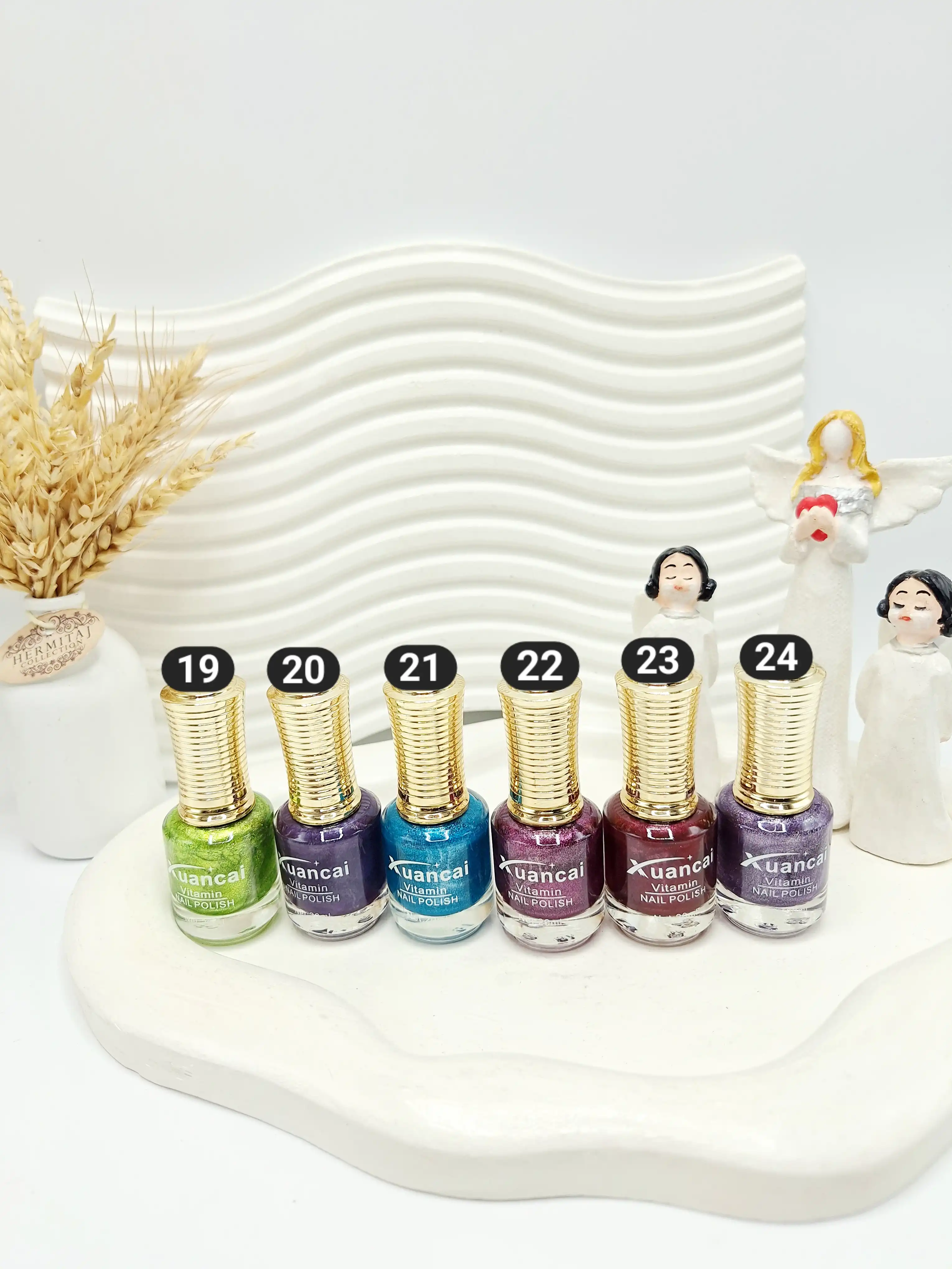 لاک ناخن دایره ای سر طلایی برند Xuancai کد 8055