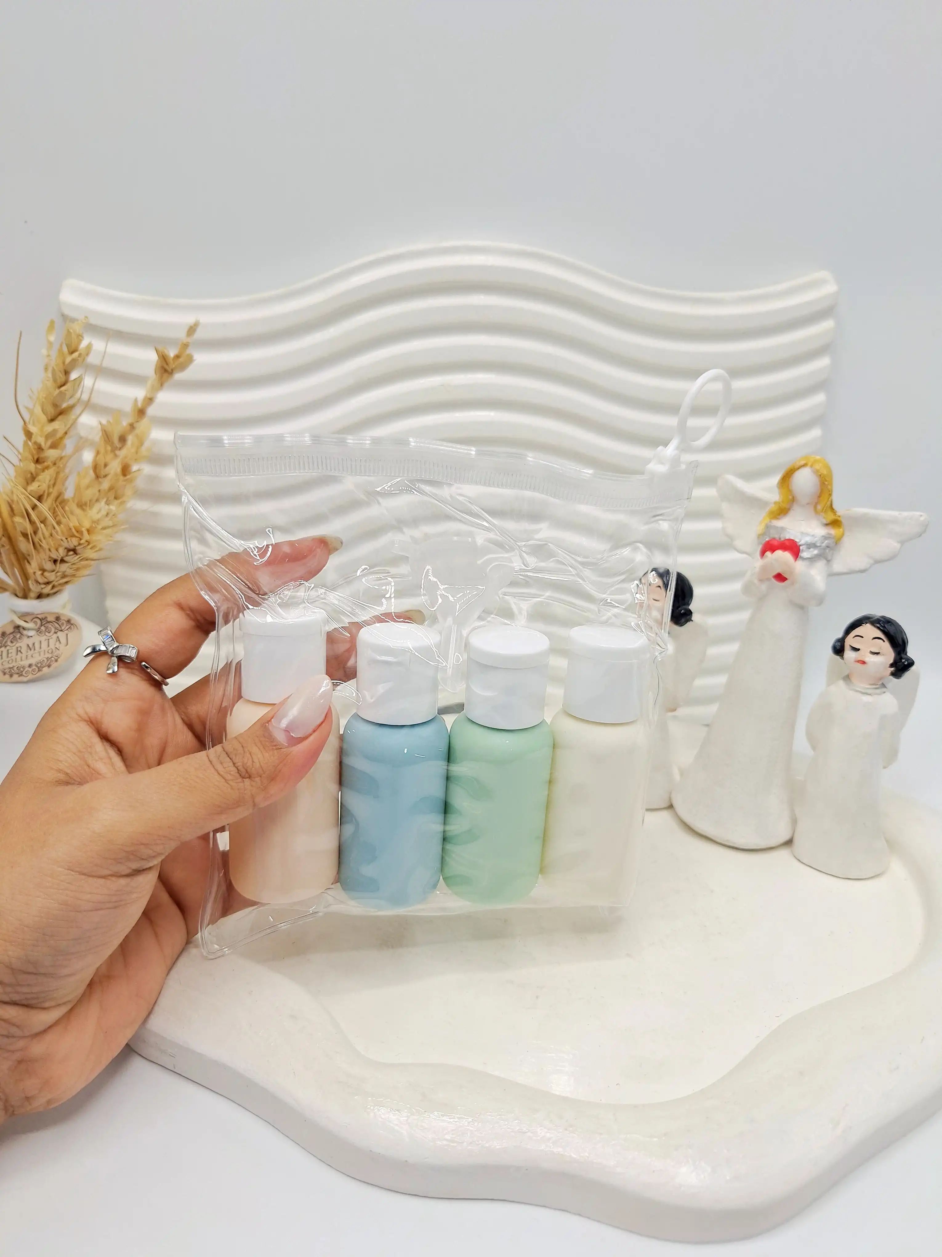 ست بطری مسافرتی سایز کوچک 4 تیکه رنگی کاور زیپی