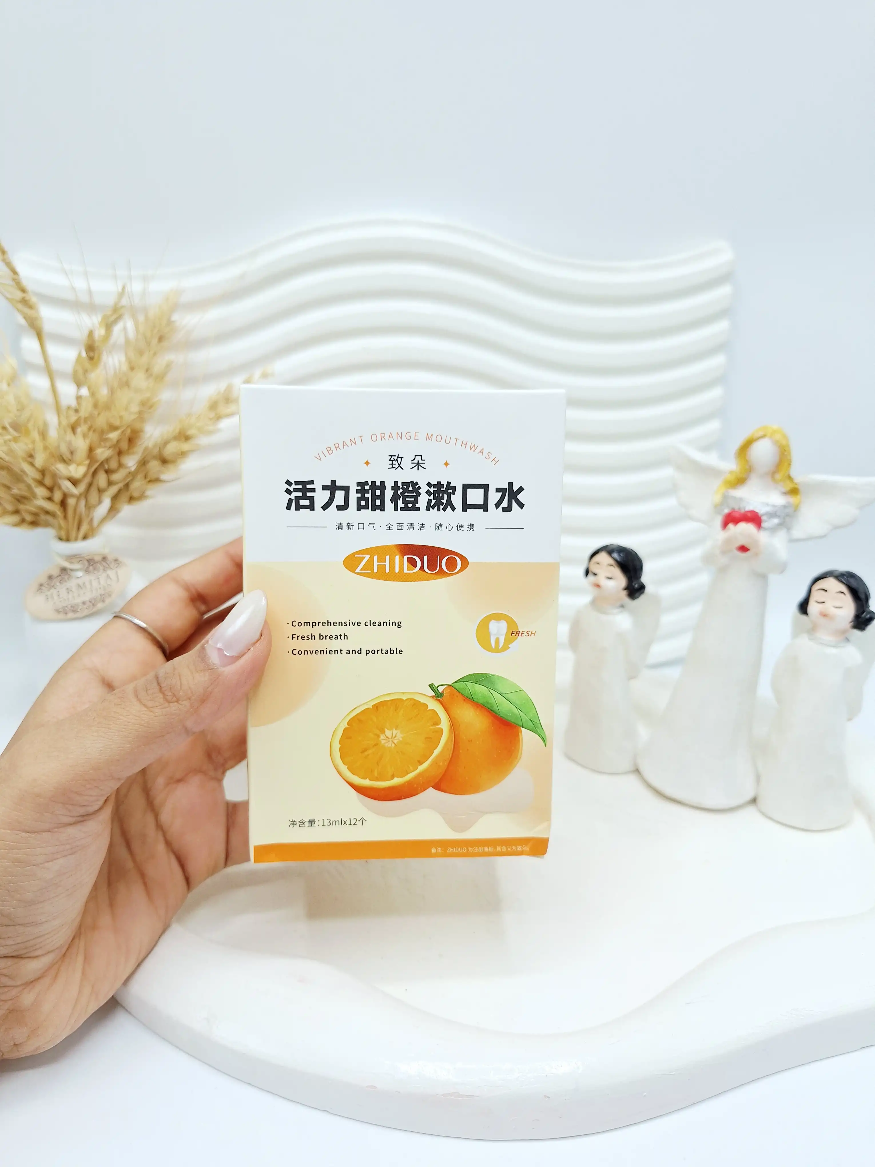 پک 12 تایی دهانشویه طراوت بخش پرتقال ZHIDUO کد 3428
