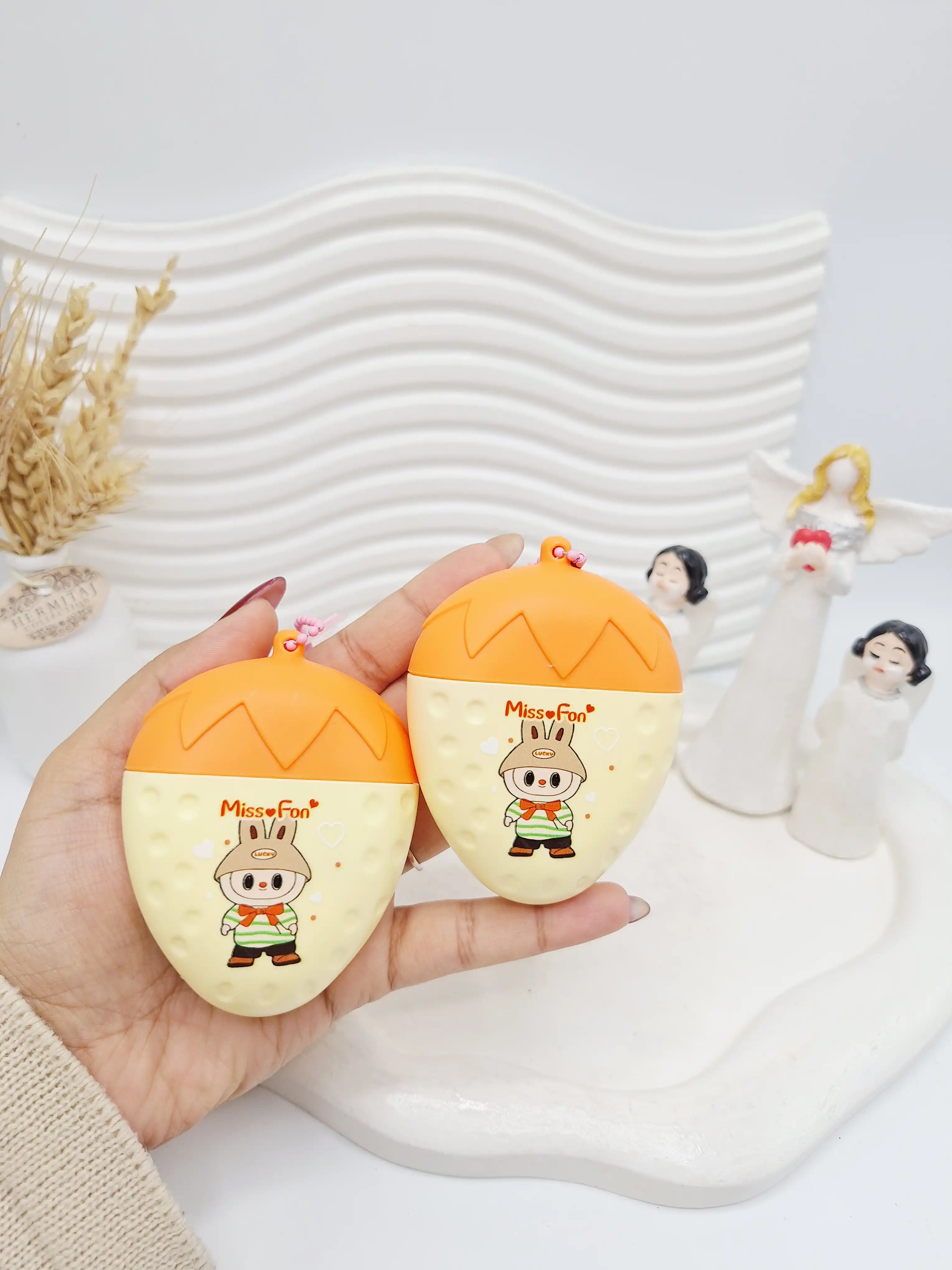 کرم ضد آفتاب لبوبو طرح توت فرنگی نارنجی spf 60