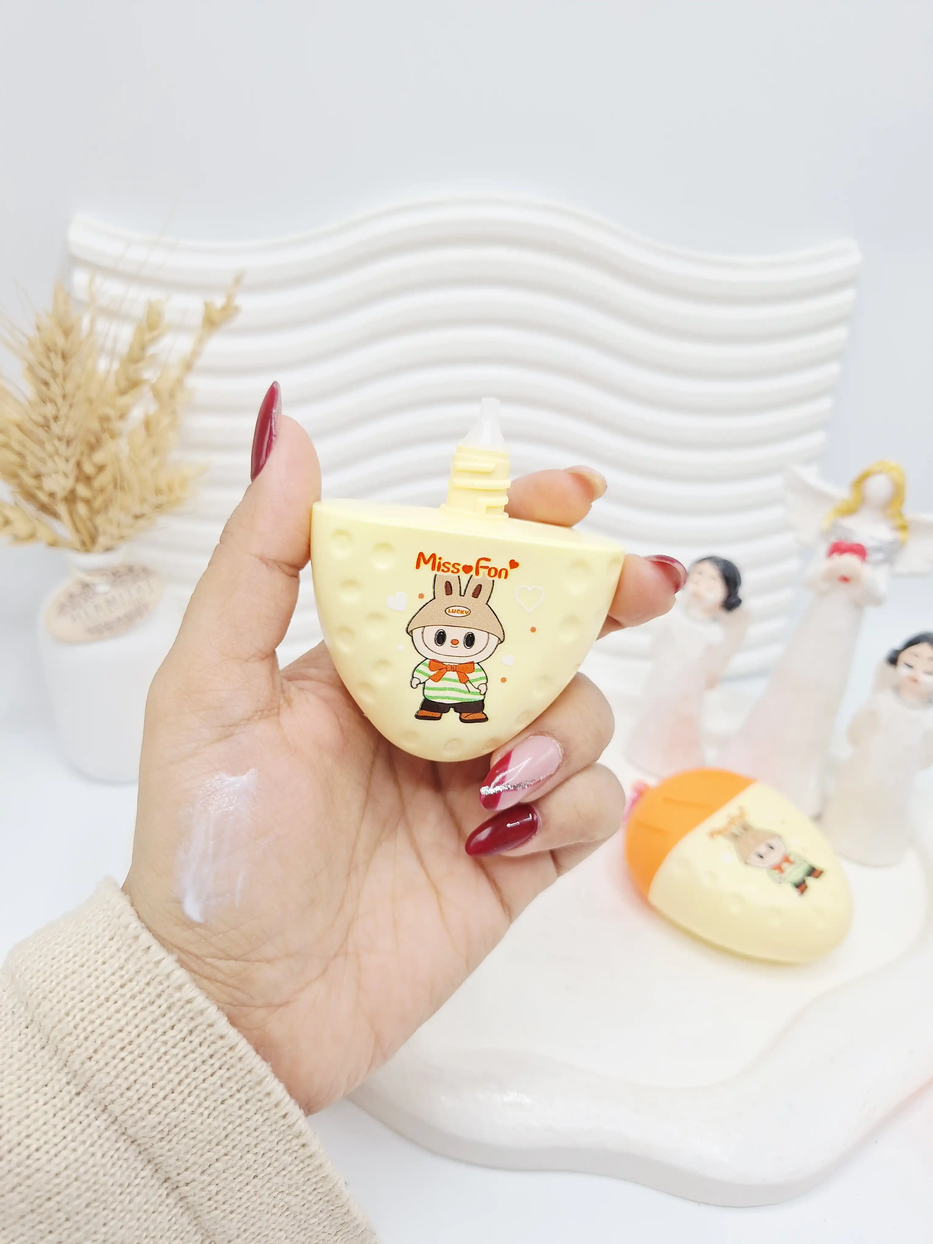 کرم ضد آفتاب لبوبو طرح توت فرنگی نارنجی spf 60