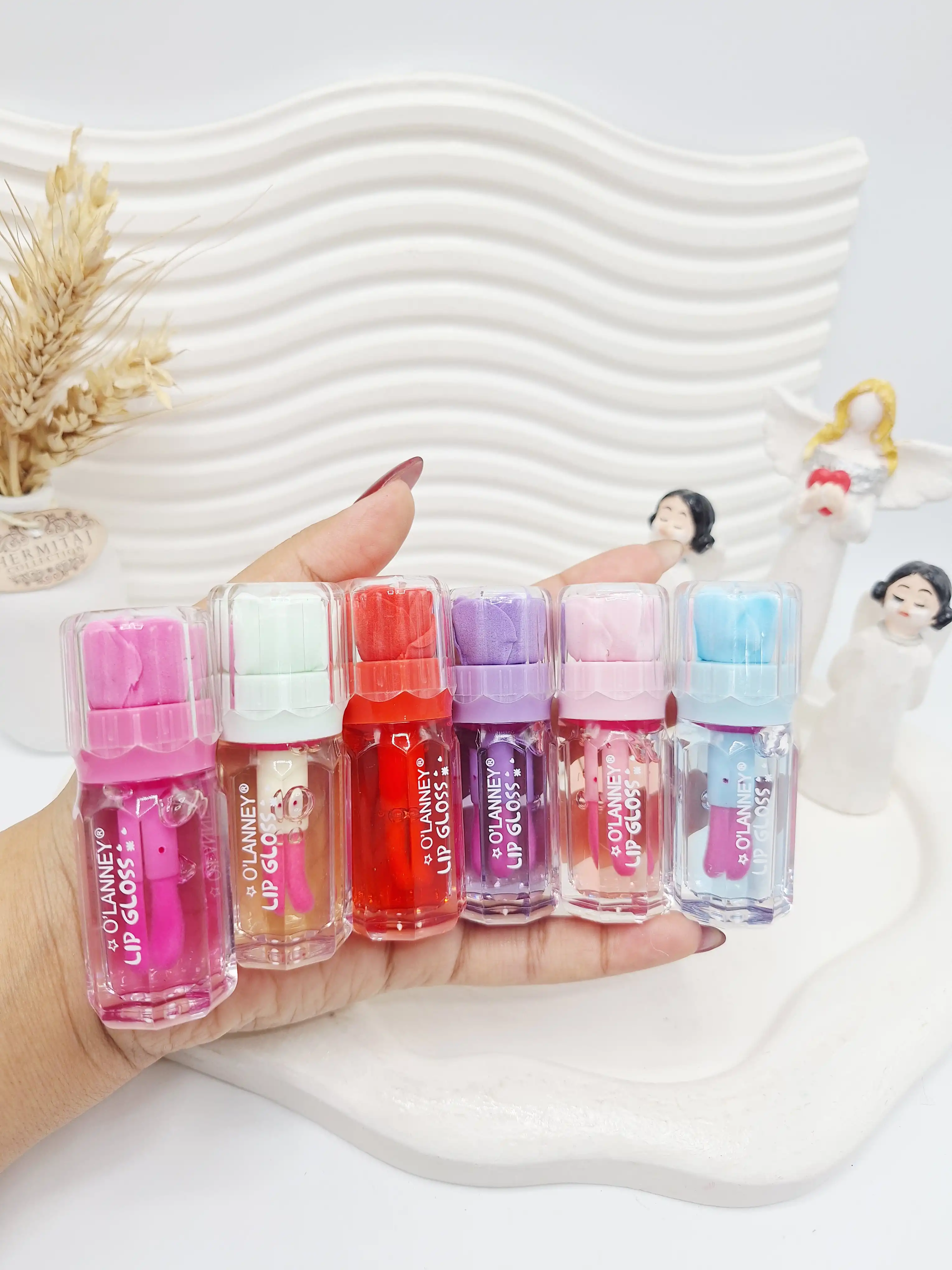 لیپ گلاس حرارتی گل رز جذاب برند O'LANNEY کد 717