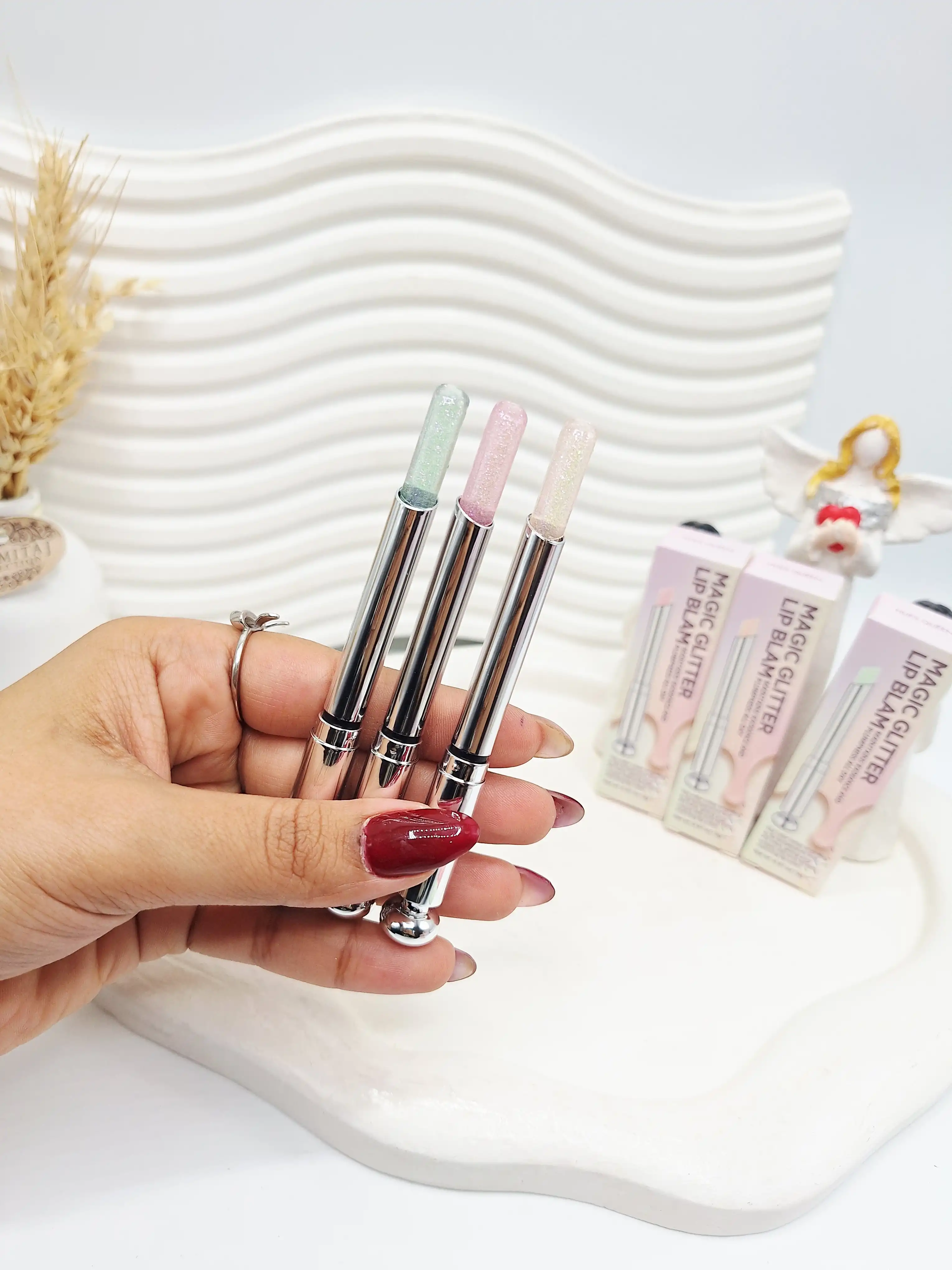 بالم لب ادایی گلیتری کهکشانی برند HUES QUEEN کد 0765