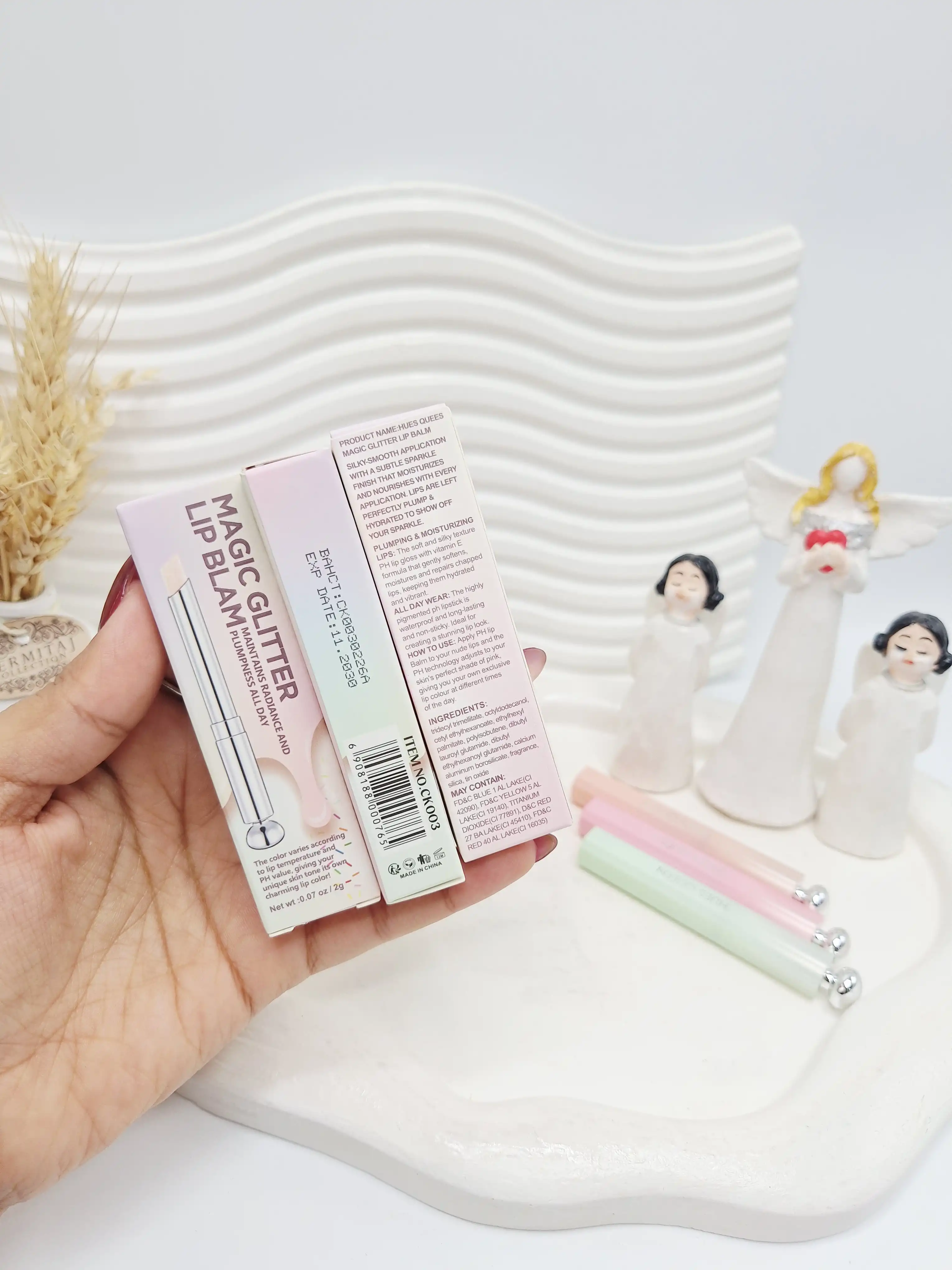 بالم لب ادایی گلیتری کهکشانی برند HUES QUEEN کد 0765