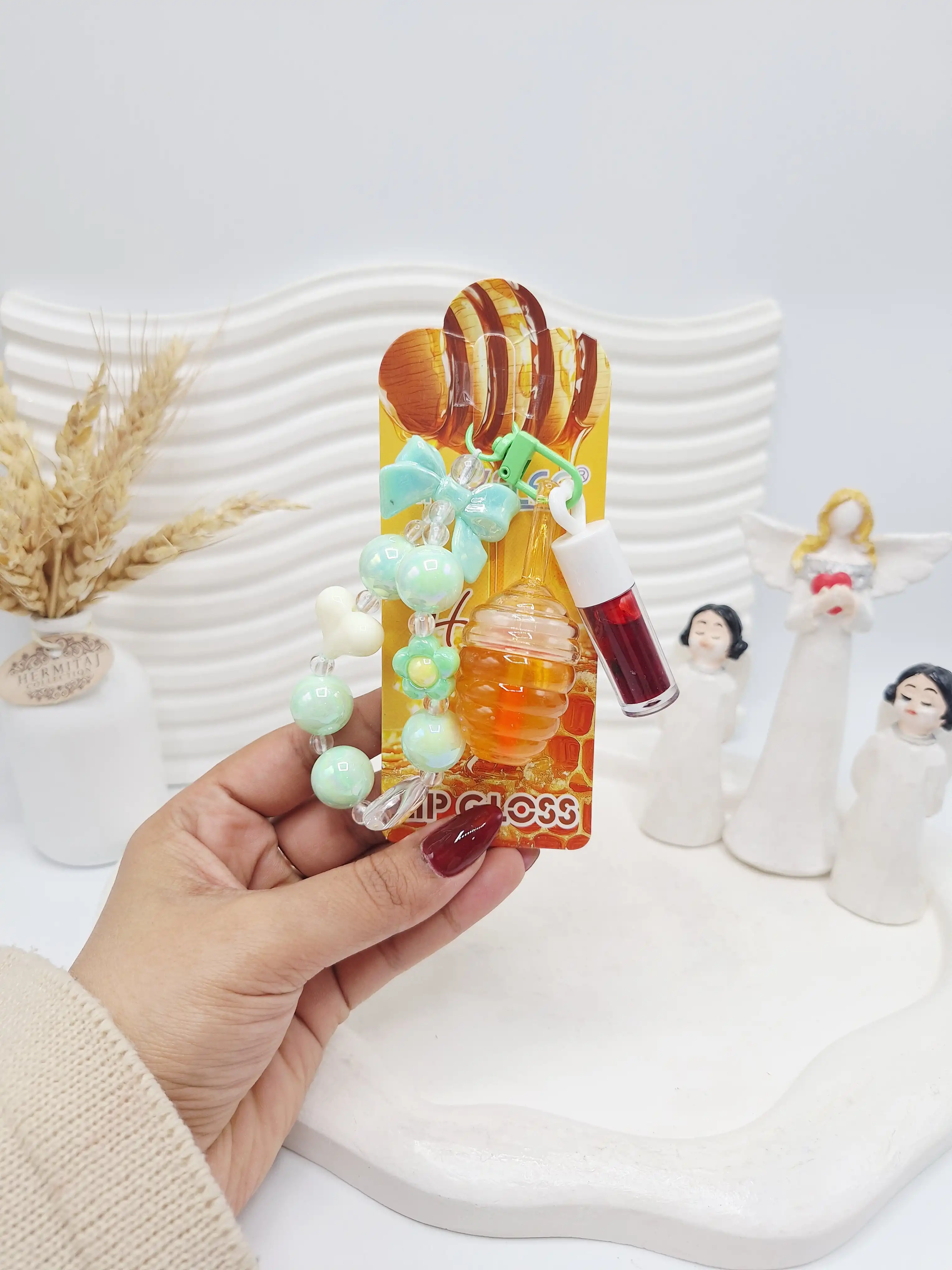 ست لیپ گلاس حرارتی عسل و تینت و دستبند برند APCKFLEE کد 040