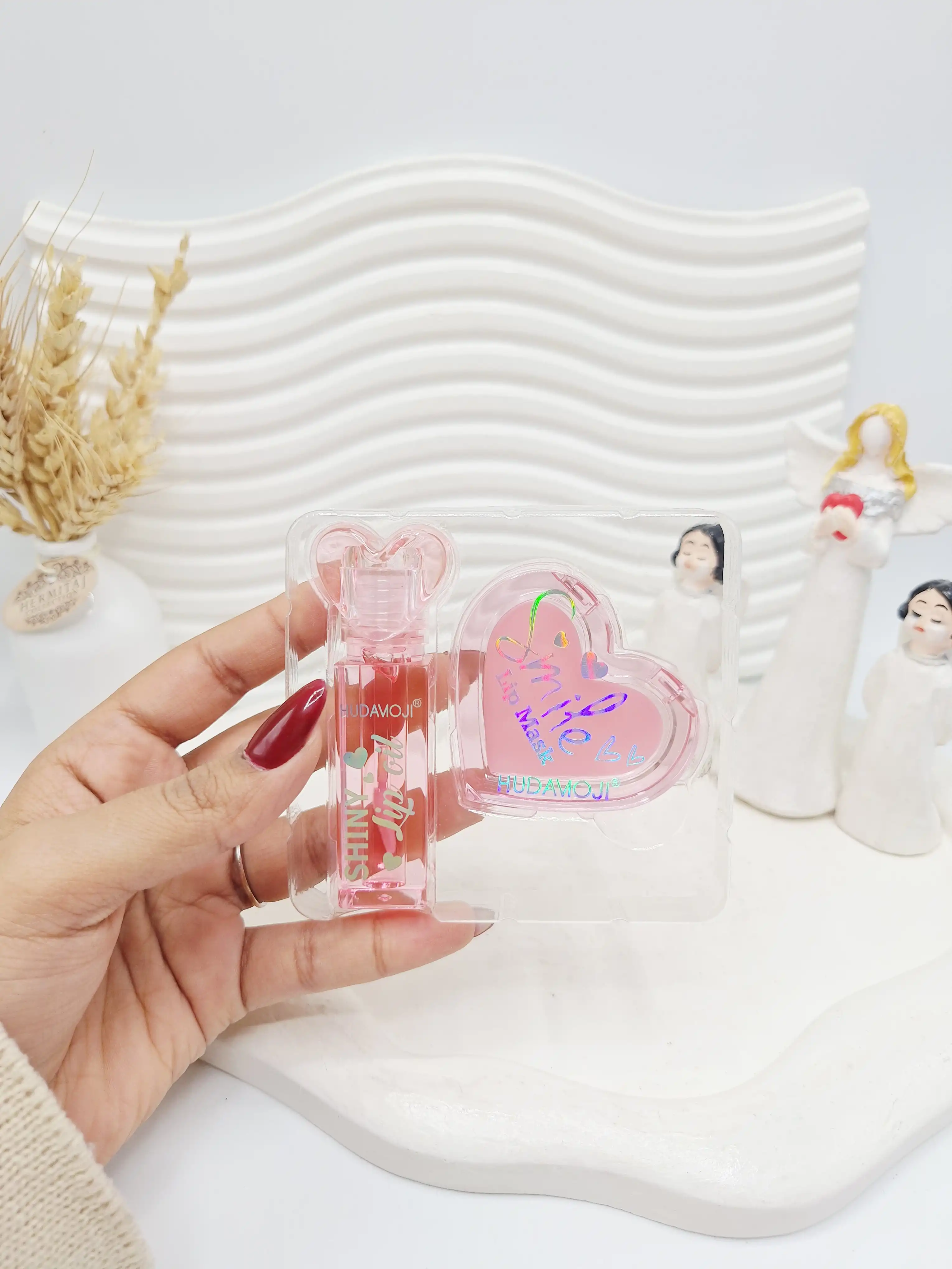 ست 2 تایی بالم لب و لیپ گلاس طرح قلبی برند هدا موجی کد 4421