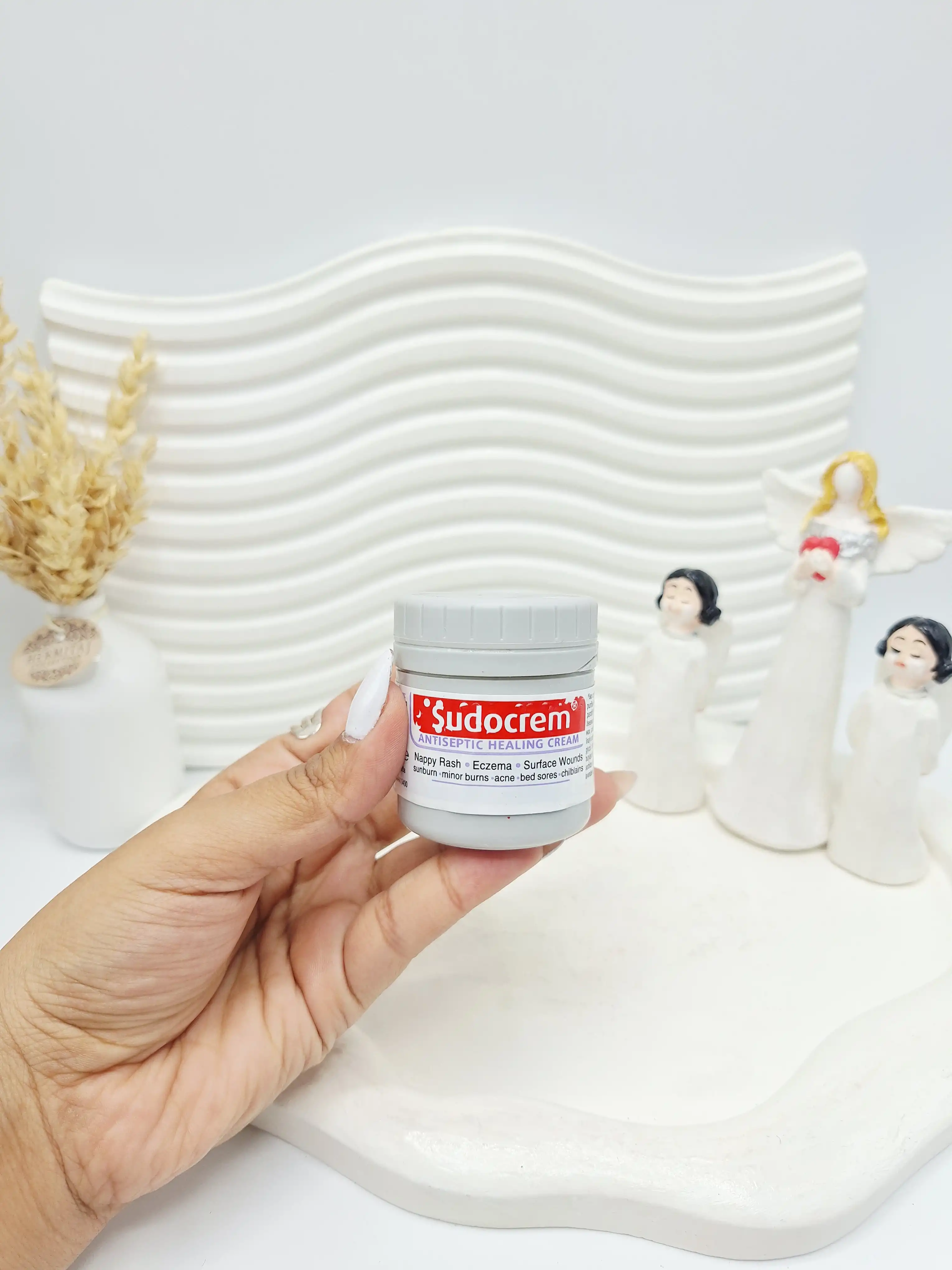 کرم ترمیم کننده سوختگی پوست کودک سودوکرم 60 گرم Sudocrem