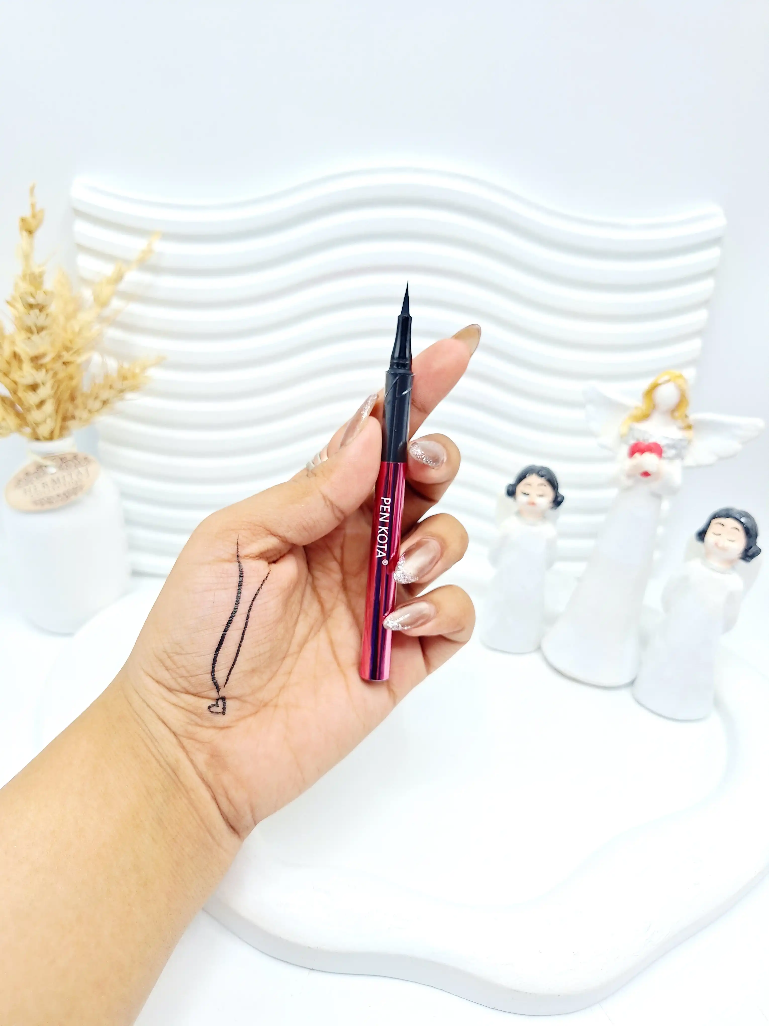 خط چشم ماژیکی پوکه صورتی برند PEN KOTA کد 1316